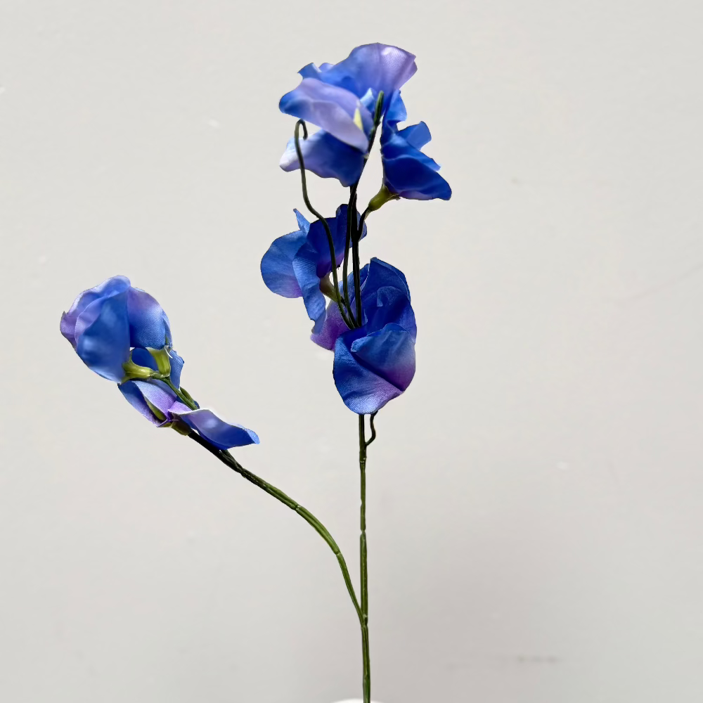 Blauwe-zijden-bloemen-levendig-kunsttak -nepbloem